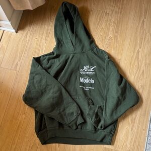 Rolling Loud x Modelo Men’s Dark Green Pullover Hoodie